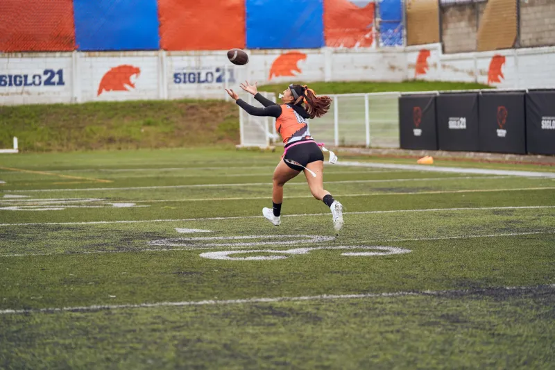 Reach Further, Decide Faster: The Paradox at the Core of Elite Catch Radius Development